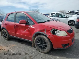 2010 Suzuki SX4 with VIN JS2YB5A33A6311624, listed as a Copart auction lot 48552935 with 236,331 mi miles and Salvage Title. Bid and sale history available at DreamBid. Image 4.