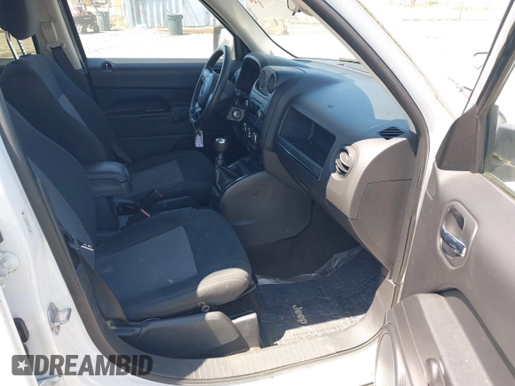 2014 Jeep Patriot Sport with VIN 1C4NJPBA6ED511990, listed as a IAAI auction lot 42644248 with 113,296 mi miles and . Bid and sale history available at DreamBid. Image 5.