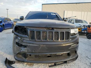 2012 Jeep Grand Cherokee SRT8 with VIN 1C4RJFDJ2CC329621, listed as a Copart auction lot 86772154 with 236,800 mi miles and Salvage Title. Bid and sale history available at carsss.com. Image 5.