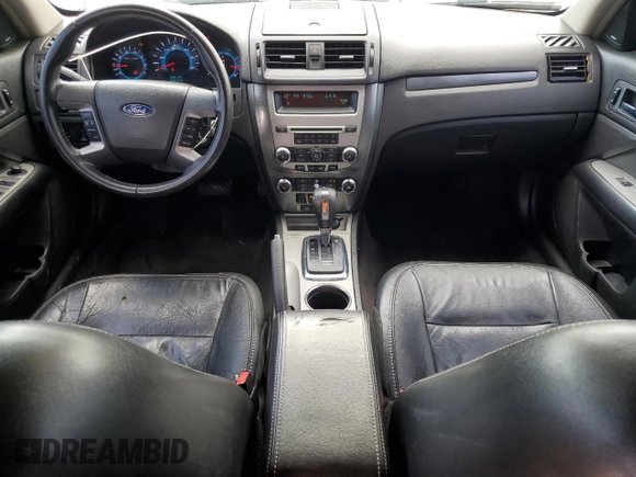 2012 Ford Fusion SEL with VIN 3FAHP0JG7CR257418, listed as a Copart auction lot 61842175 with 167,669 mi miles and Salvage title. Bid and sale history available at DreamBid. Image 8.