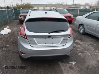 2017 Ford Fiesta SE with VIN 3FADP4EJ5HM104763, listed as a IAAI auction lot 42009697 with 117,980 mi miles. Bid and sale history available at carsss.com. Image 16.
