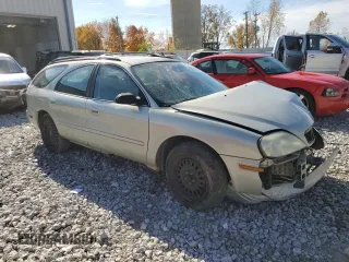 2004 Mercury Sable z VIN 1MEFM58UX4A612059, wystawiony jako Copart lot #77181894 z przebiegiem Nie podano mil oraz Czysty tytuł • Clean title. Historia ofert i sprzedaży dostępna na DreamBid. Obrazek 4.