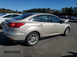 2018 Ford Focus SE with VIN 1FADP3F23JL219189, listed as a Copart auction lot 52209335 with 101,180 mi miles and Salvage title. Bid and sale history available at DreamBid. Image 3.