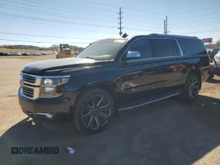 2015 Chevrolet Suburban LTZ with VIN 1GNSKKKC2FR634654, listed as a Copart auction lot 50337415 with 150,255 mi miles and Salvage Title. Bid and sale history available at DreamBid. Image 1.