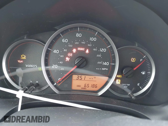 2013 Toyota Yaris L with VIN JTDKTUD38DD570483, listed as a IAAI auction lot 42071550 with 65,186 mi miles and . Bid and sale history available at DreamBid. Image 7.