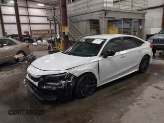 2023 Honda Civic Sport z VIN 2HGFE2F51PH517583, wystawiony jako IAAI lot #41986930 z przebiegiem 42 604 mil mil oraz . Historia ofert i sprzedaży dostępna na DreamBid. Obrazek 17.