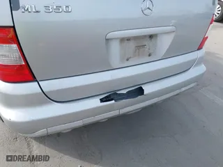 2003 Mercedes-Benz M-Class 3.7L with VIN 4JGAB57EX3A435535, listed as a IAAI auction lot 42099551 with 205,226 mi miles. Bid and sale history available at carsss.com. Image 6.