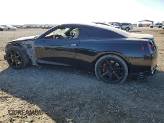 2015 Nissan GT-R Premium z VIN JN1AR5EFXFM280731, wystawiony jako Copart lot #77720934 z przebiegiem 96 483 mil mil oraz Szkoda całkowita • Salvage title. Historia ofert i sprzedaży dostępna na DreamBid. Obrazek 2.