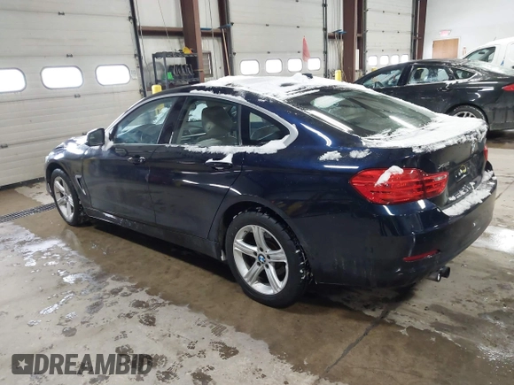 2015 BMW 4 Series 428i xDrive with VIN WBA4A7C57FD414955, listed as a IAAI auction lot 41609214 with 69,125 mi miles and . Bid and sale history available at DreamBid. Image 3.