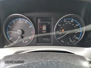 2018 Toyota RAV4 XLE with VIN 2T3WFREV3JW469307, listed as a Copart auction lot 57092295 with 47,639 mi miles and Salvage title. Bid and sale history available at DreamBid. Image 9.
