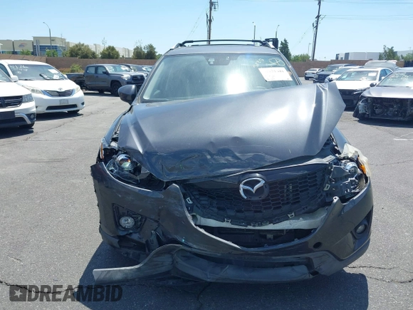 2014 Mazda CX-5 Grand Touring with VIN JM3KE4DY8E0391317, listed as a IAAI auction lot 41871641 with 77,048 mi miles. Bid and sale history available at carsss.com. Image 12.