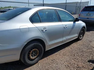 2013 Volkswagen Jetta Sedan S with VIN 3VW2K7AJ2DM412424, listed as a IAAI auction lot 42093728 with 130,688 mi miles. Bid and sale history available at carsss.com. Image 6.