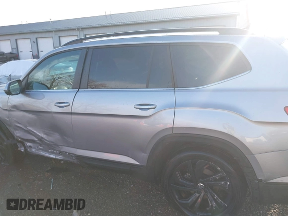 2023 Volkswagen Atlas SE with VIN 1V2HR2CA6PC523233, listed as a IAAI auction lot 41952399 with 28,387 mi miles and . Bid and sale history available at DreamBid. Image 14.