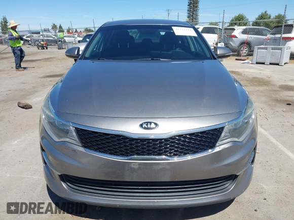 2016 Kia Optima LX with VIN 5XXGT4L36GG098804, listed as a IAAI auction lot 42772231 with 206,471 mi miles and . Bid and sale history available at DreamBid. Image 13.
