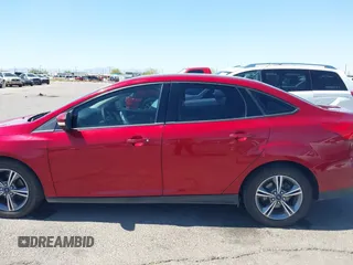 2017 Ford Focus SE with VIN 1FADP3FE3HL206074, listed as a IAAI auction lot 42594911 with 143,814 mi miles and . Bid and sale history available at DreamBid. Image 14.