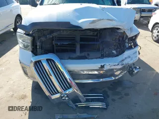 2015 Ram 1500 Big Horn with VIN 1C6RR7LTXFS588831, listed as a IAAI auction lot 41635371 with 211,677 mi miles and . Bid and sale history available at DreamBid. Image 6.