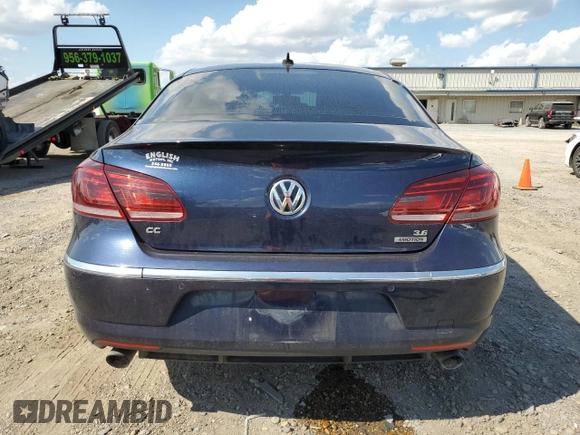 2015 Volkswagen CC VR6 Executive 4Motion with VIN WVWGU7AN2FE803426, listed as a Copart auction lot 69841003 with 100,110 mi miles. Bid and sale history available at carsss.com. Image 6.