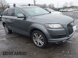 2015 Audi Q7 3.0T Premium Plus with VIN WA1LGAFE7FD013891, listed as a IAAI auction lot 41819325 with 999,999 mi miles. Bid and sale history available at carsss.com. Image 1.