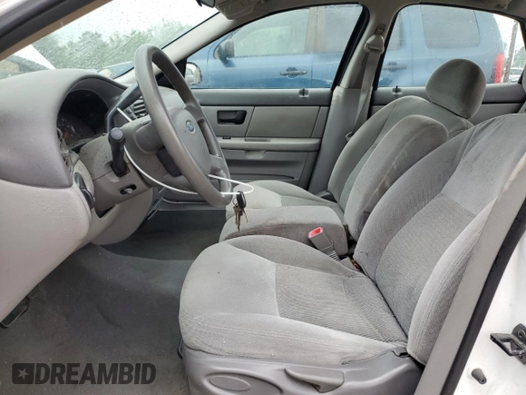 2007 Ford Taurus SE with VIN 1FAFP53U87A138588, listed as a Copart auction lot 56965245 with Not provided miles and Salvage title. Bid and sale history available at DreamBid. Image 7.