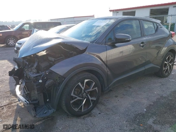 2020 Toyota C-HR LE with VIN JTNKHMBXXL1087676, listed as a IAAI auction lot 41662260 with 68,870 mi miles. Bid and sale history available at carsss.com. Image 2.