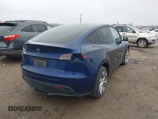 2023 Tesla Model Y Long Range with VIN 7SAYGDEE4PA064743, listed as a IAAI auction lot 41523760 with 41,113 mi miles. Bid and sale history available at carsss.com. Image 4.
