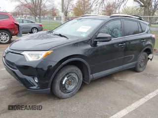 2016 Toyota RAV4 LE with VIN 2T3BFREV3GW447802, listed as a IAAI auction lot 41985438 with 213,247 mi miles. Bid and sale history available at carsss.com. Image 17.