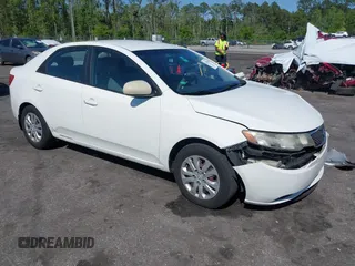 2012 Kia Forte LX with VIN KNAFT4A28C5582135, listed as a IAAI auction lot 42072048 with 126,491 mi miles. Bid and sale history available at carsss.com. Image 1.