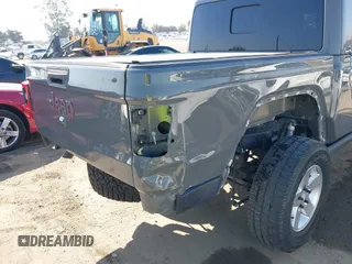 2020 Jeep Gladiator Rubicon with VIN 1C6JJTBG6LL149469, listed as a IAAI auction lot 42224826 with 58,870 mi miles and . Bid and sale history available at DreamBid. Image 6.