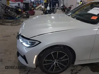 2021 BMW 3 Series 330i xDrive with VIN 3MW5R7J01M8C07735, listed as a IAAI auction lot 41570956 with 70,915 mi miles and . Bid and sale history available at carsss.com. Image 21.