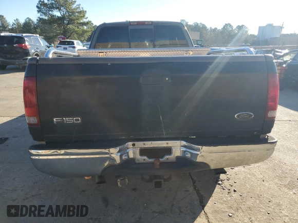 2000 Ford F-150 XL with VIN 1FTRX17L4YNA56465, listed as a Copart auction lot 42381515 with 0 mi miles and Salvage Title. Bid and sale history available at carsss.com. Image 6.