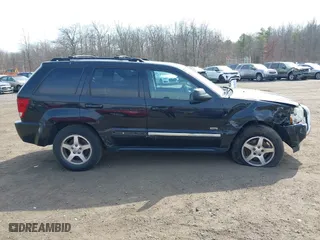 2006 Jeep Grand Cherokee Laredo with VIN 1J4HR48N76C265919, listed as a IAAI auction lot 41738435 with 133,286 mi miles. Bid and sale history available at carsss.com. Image 12.