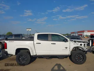 2021 Chevrolet Colorado 4WD Z71 with VIN 1GCGTDEN6M1166282, listed as a IAAI auction lot 40316921 with 35,515 mi miles and . Bid and sale history available at DreamBid. Image 13.