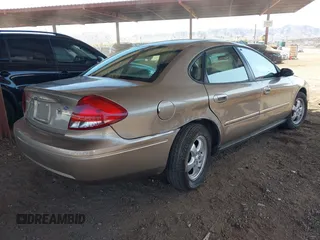 2004 Ford Taurus SES with VIN 1FAFP55S94G159454, listed as a IAAI auction lot 41848575 with Not Provided miles and . Bid and sale history available at DreamBid. Image 4.