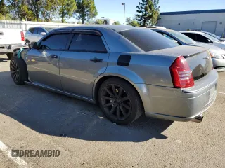 2006 Chrysler 300 C SRT8 with VIN 2C3KA73W06H228944, listed as a Copart auction lot 79866804 with 102,448 mi miles and Salvage Title. Bid and sale history available at carsss.com. Image 2.