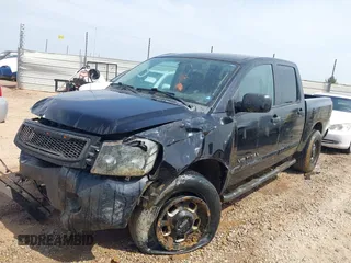 2012 Nissan Titan SV with VIN 1N6AA0EK2CN306066, listed as a IAAI auction lot 42106379 with 135,556 mi miles and . Bid and sale history available at DreamBid. Image 17.