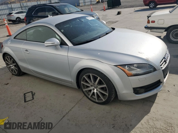 2009 Audi TT z VIN TRUKF38J391020407, wystawiony jako Copart lot #62101664 z przebiegiem 91 585 mil mil oraz Szkoda całkowita • Salvage title. Historia ofert i sprzedaży dostępna na DreamBid. Obrazek 4.