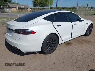 2022 Tesla Model S z VIN 5YJSA1E59NF470813, wystawiony jako IAAI lot #41935297 z przebiegiem Nie podano mil oraz . Historia ofert i sprzedaży dostępna na DreamBid. Obrazek 4.