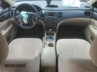2009 Kia Optima LX z VIN KNAGE228395313765, wystawiony jako Copart lot #59707675 z przebiegiem 170 773 mil mil oraz Szkoda całkowita • Salvage title. Historia ofert i sprzedaży dostępna na DreamBid. Obrazek 8.