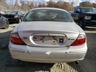 2002 Jaguar S-Type with VIN SAJDA03P22GM36867, listed as a Copart auction lot 79027454 with 52,489 mi miles and Salvage Title. Bid and sale history available at DreamBid. Image 6.