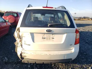 2009 Kia Rondo LX Base with VIN KNAFG528597268730, listed as a Copart auction lot 77071064 with 151,159 mi miles and Salvage Title. Bid and sale history available at carsss.com. Image 6.