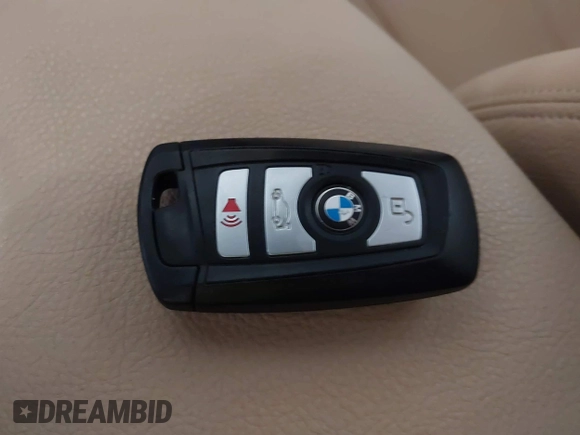 2018 BMW 3 Series 320i xDrive with VIN WBA8E5G56JNU47338, listed as a IAAI auction lot 41238204 with 54,596 mi miles. Bid and sale history available at carsss.com. Image 11.