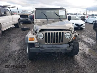 2004 Jeep Wrangler Sport with VIN 1J4FA49S94P711531, listed as a IAAI auction lot 41306863 with 143,720 mi miles and . Bid and sale history available at DreamBid. Image 13.