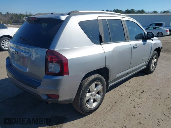 2016 Jeep Compass 75th Anniversary with VIN 1C4NJCBBXGD693892, listed as a IAAI auction lot 41651029 with 81,211 mi miles and . Bid and sale history available at DreamBid. Image 4.