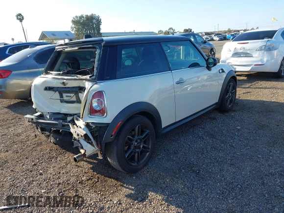 2011 MINI Hardtop with VIN WMWSU3C54BT252130, listed as a IAAI auction lot 41854369 with 145,528 mi miles and . Bid and sale history available at DreamBid. Image 4.