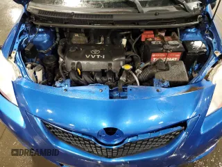 2009 Toyota Yaris with VIN JTDBT903991315725, listed as a Copart auction lot 52566735 with 177,044 mi miles and Salvage Title. Bid and sale history available at DreamBid. Image 11.