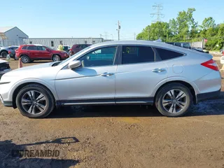 2013 Honda Crosstour EX-L z VIN 5J6TF2H56DL002499, wystawiony jako IAAI lot #42349382 z przebiegiem 174 542 mil mil oraz . Historia ofert i sprzedaży dostępna na DreamBid. Obrazek 14.