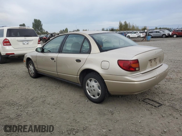 2001 Saturn SL z VIN 1G8ZH52831Z348124, wystawiony jako Copart lot #76058854 z przebiegiem 191 465 mil mil oraz Szkoda całkowita • Salvage title. Historia ofert i sprzedaży dostępna na DreamBid. Obrazek 2.