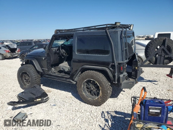 2008 Jeep Wrangler Rubicon with VIN 1J4GA64178L632855, listed as a Copart auction lot 49717905 with 92,031 mi miles and Salvage title. Bid and sale history available at DreamBid. Image 2.