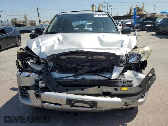 2009 Toyota RAV4 with VIN JTMZF33V39D007979, listed as a Copart auction lot 52054865 with 179,446 mi miles and Salvage Title. Bid and sale history available at DreamBid. Image 5.