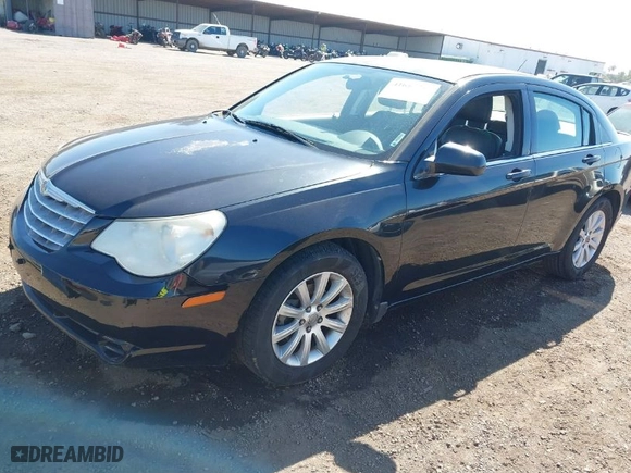 2010 Chrysler Sebring Limited with VIN 1C3CC5FB8AN140459, listed as a IAAI auction lot 41657740 with NaN miles. Bid and sale history available at carsss.com. Image 2.
